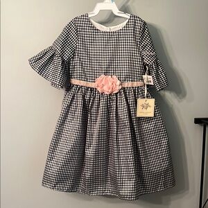 Charming Black and White Checkered Kids Dress with Pink Accents
